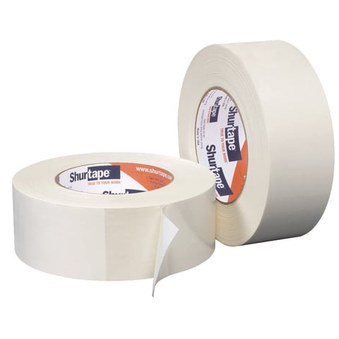 Two rolls of Shurtape clear packing tape, one fully wound and one partially unrolled showing adhesive surface