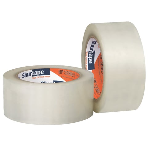 Two rolls of Shurtape clear packing tape with orange and white branding labels on white background